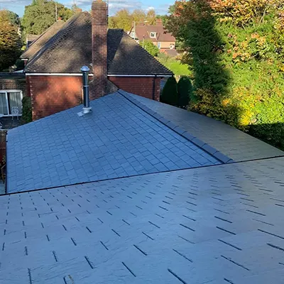 A view of a house from the top of a roof.